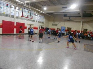 Basketball Game in Gym